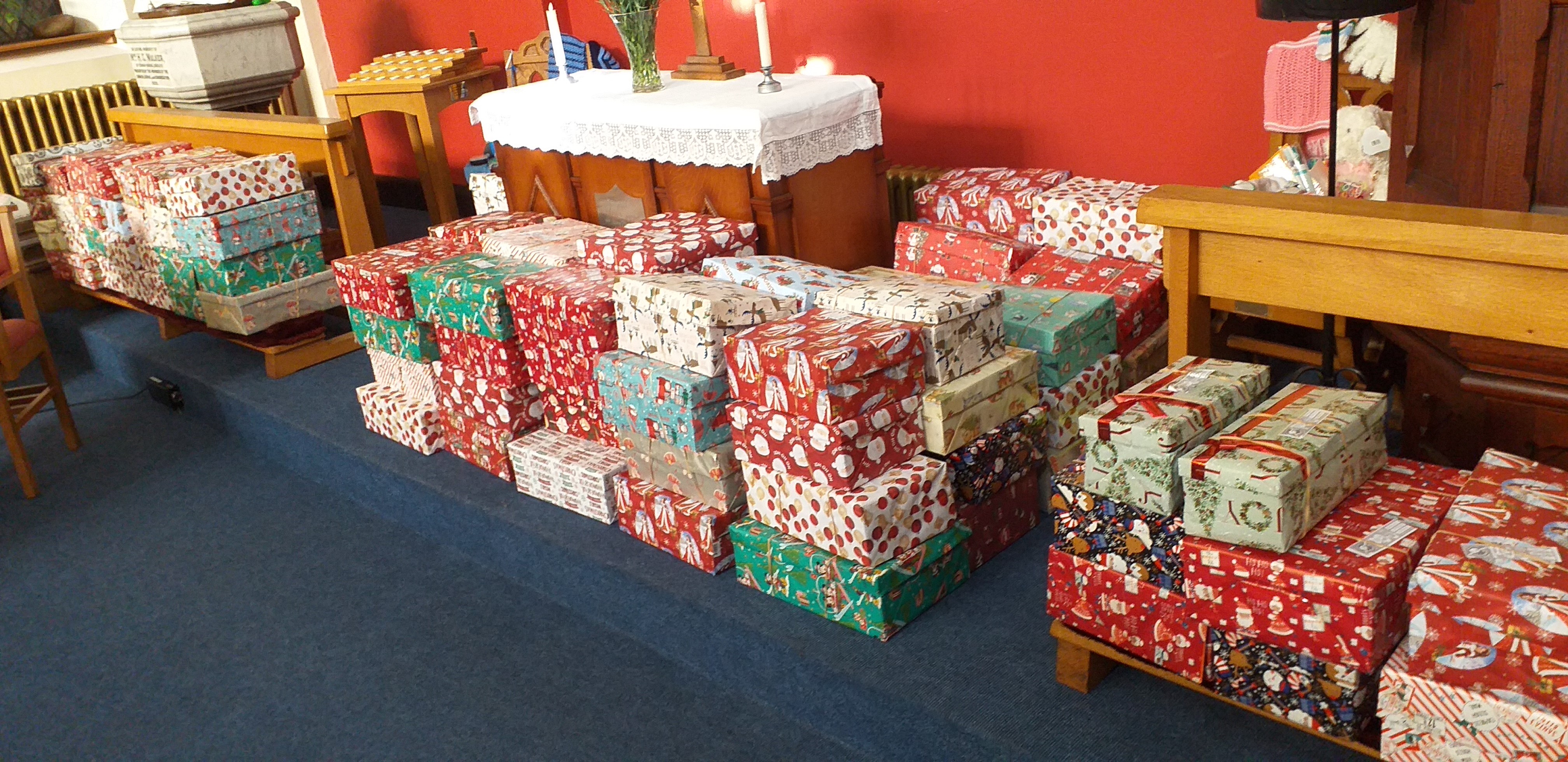 pile of colourful shoebox gifts