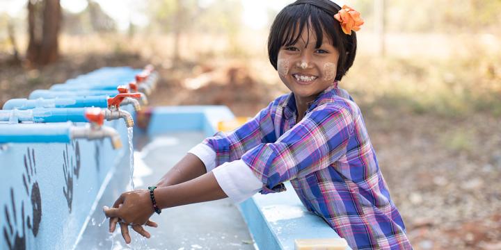 girl washing her hands