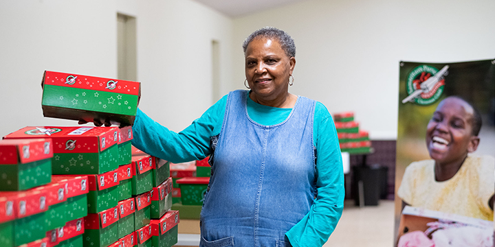 project leader with preprinted shoeboxes