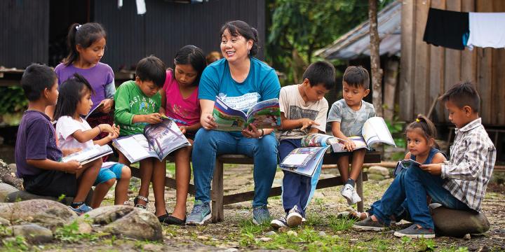 Children listening to preaching from The Greatest Journey