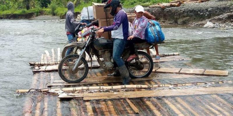 Pastor Jacob and his family traveled with the team across three rivers to deliver Operation Christmas Child shoebox gifts to the unreached children.