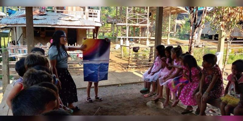 Pastor Jacob’s wife and daughter shared the Gospel with the children at the outreach event using posters supplied by Samaritan’s Purse.