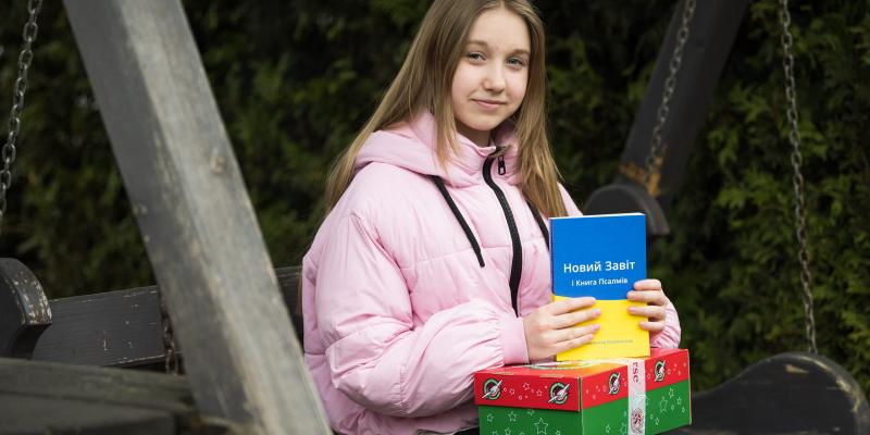 Girl with shoebox