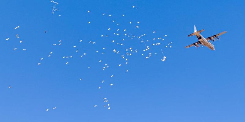 Though they looked like leaflets against the open sky, each of those parcels carried life-saving food for distressed areas.