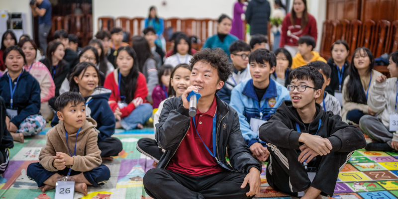 MANH, right, enjoys learning during  English club