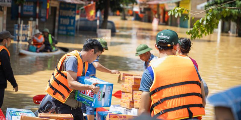 Samaritan’s Purse teams use boats to carry supplies to families still stranded in their homes.