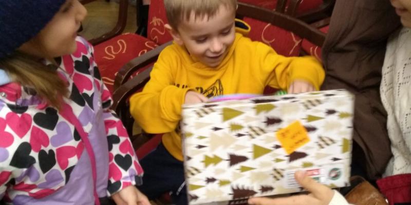 This one couldn’t wait to open his shoebox full of gifts!