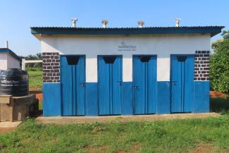 Latrine and hand washing station