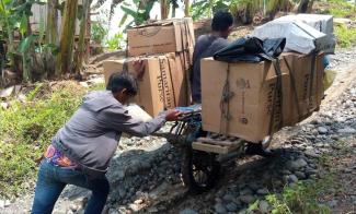 Moving shoebox gifts uphill 