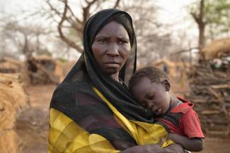 AMIRA HAD TO FLEE, LEAVING SOME OF HER SEVEN CHILDREN BEHIND. SHE IS NOW IN A CAMP WITH FOUR OF HER CHILDREN AND HER MOTHER, WHO IS BLIND.