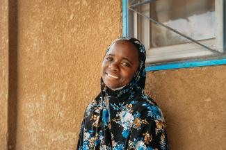 ONE OF A NUMBER OF PATIENTS FLASHES A SMILE FOLLOWING HER RECOVERY AFTER CORRECTIVE FISTULA SURGERY THAT WILL BRING NORMALCY AND COMMUNITY BACK TO HER LIFE.