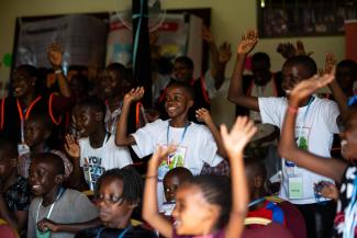 CHILDREN AT HEART CAMP ENJOY TIMES OF PRAISE AND WORSHIP.