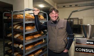 Samaritan’s Purse helped Sergey, a bivocational pastor, rebuild his bakery after his family was displaced by fighting in eastern Ukraine. Today, his freshly-baked bread continues to open doors for the Gospel in his new community.