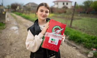 Ketevan received a gift-filled Operation Christmas Child shoebox from Korean missionaries working in her home country of Georgia. Now a believer, she prays for revival in her nation.