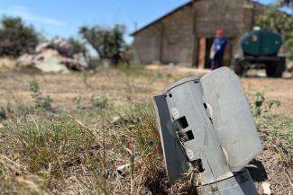 After the enemy occupation, shrapnel and mines riddled the fields on Andriy’s and Borys’ farm.