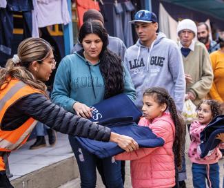 MANUEL AND HIS FAMILY were glad to receive blankets and other emergency supplies.