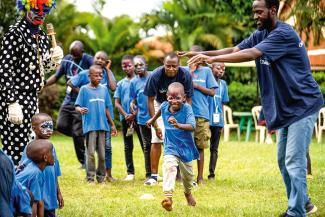 CHILDREN ARE EXCITED to run and play with their new friends.