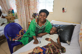 Elizabeth and her mother give thanks for the care they received through Samaritan’s Purse.